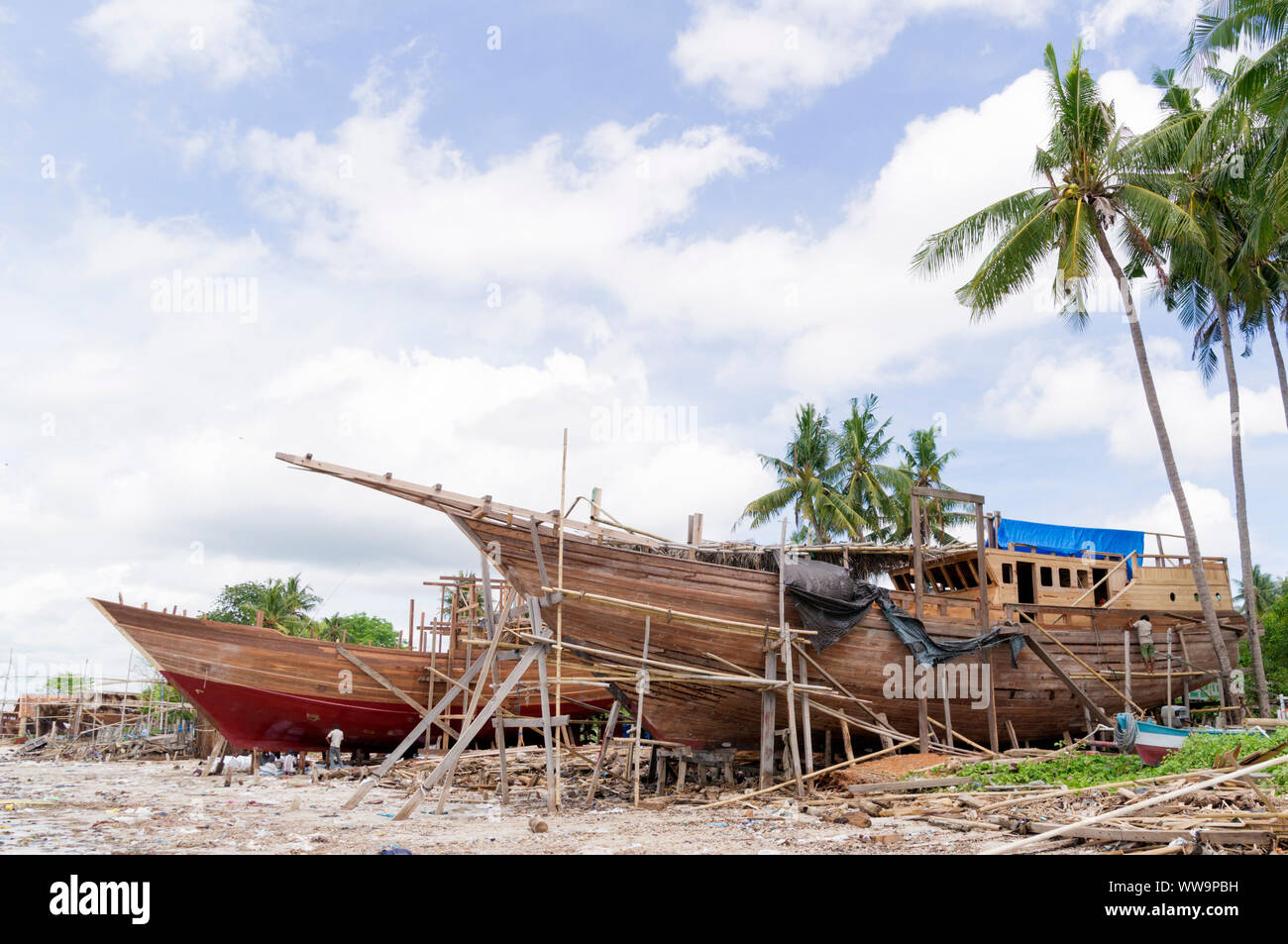 Traditional wooden boat being built at Bira, in South SUlawesi Stock Photo