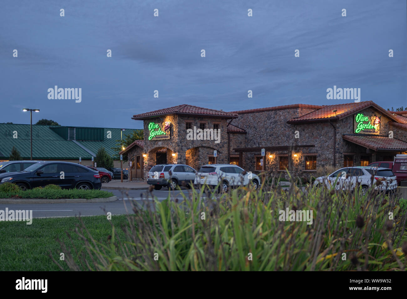 New Hartford, NY - SEPTEMBER 09, 2019: Exterior of Olive Garden Italian Kitchen Restaurant Location. Olive Garden is a chain restaurant that offers ca Stock Photo
