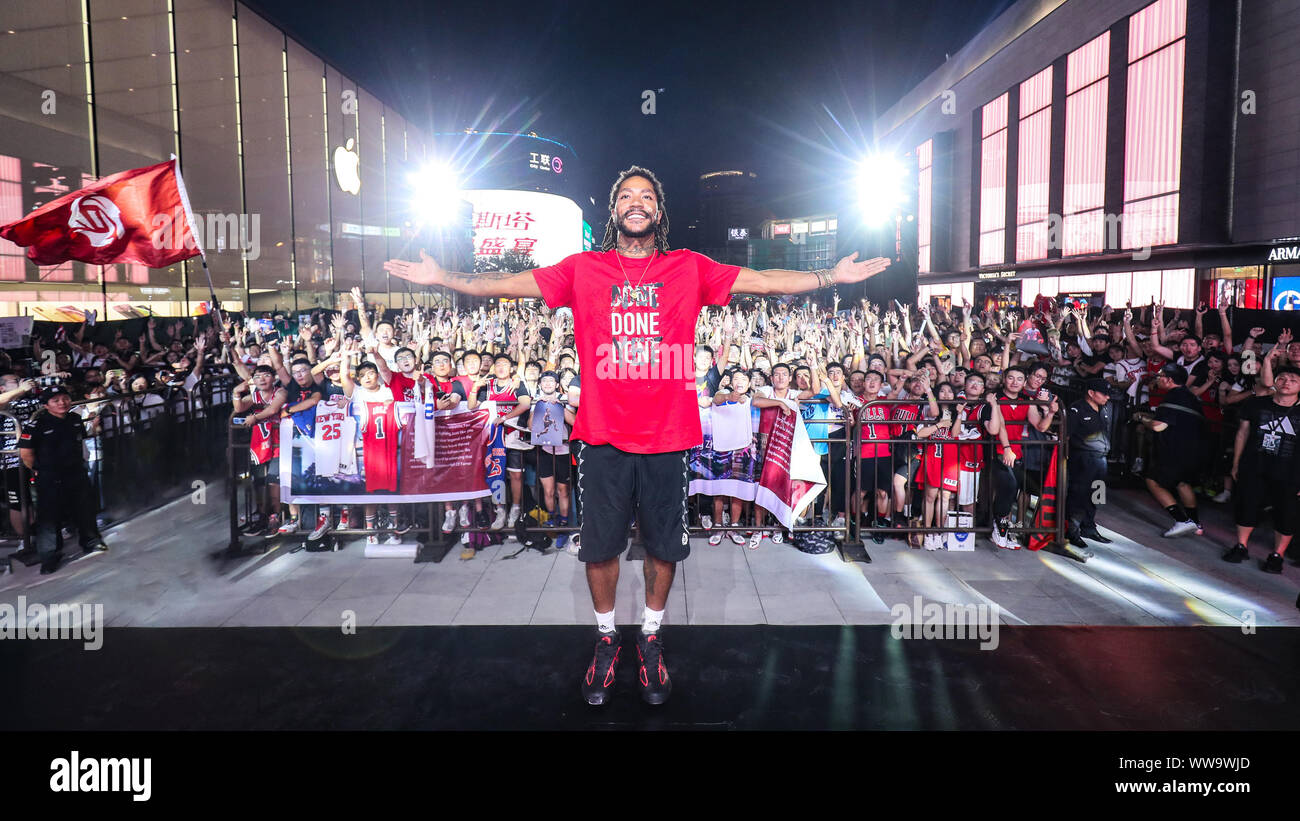 American professional basketball player Derrick Rose shows up at an Adidas  promotional event and celebrates Mid-Autumn Festival with local fans by  learning to make mooncake in Hangzhou city, east China's Zhejiang province,