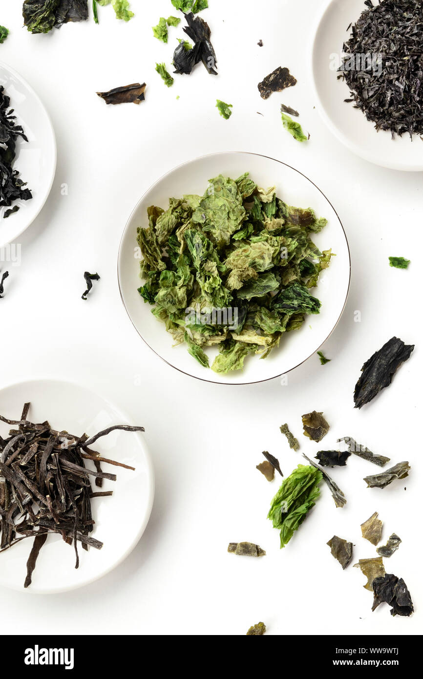 Various dry seaweed, sea vegetables, shot from above on a white background Stock Photo