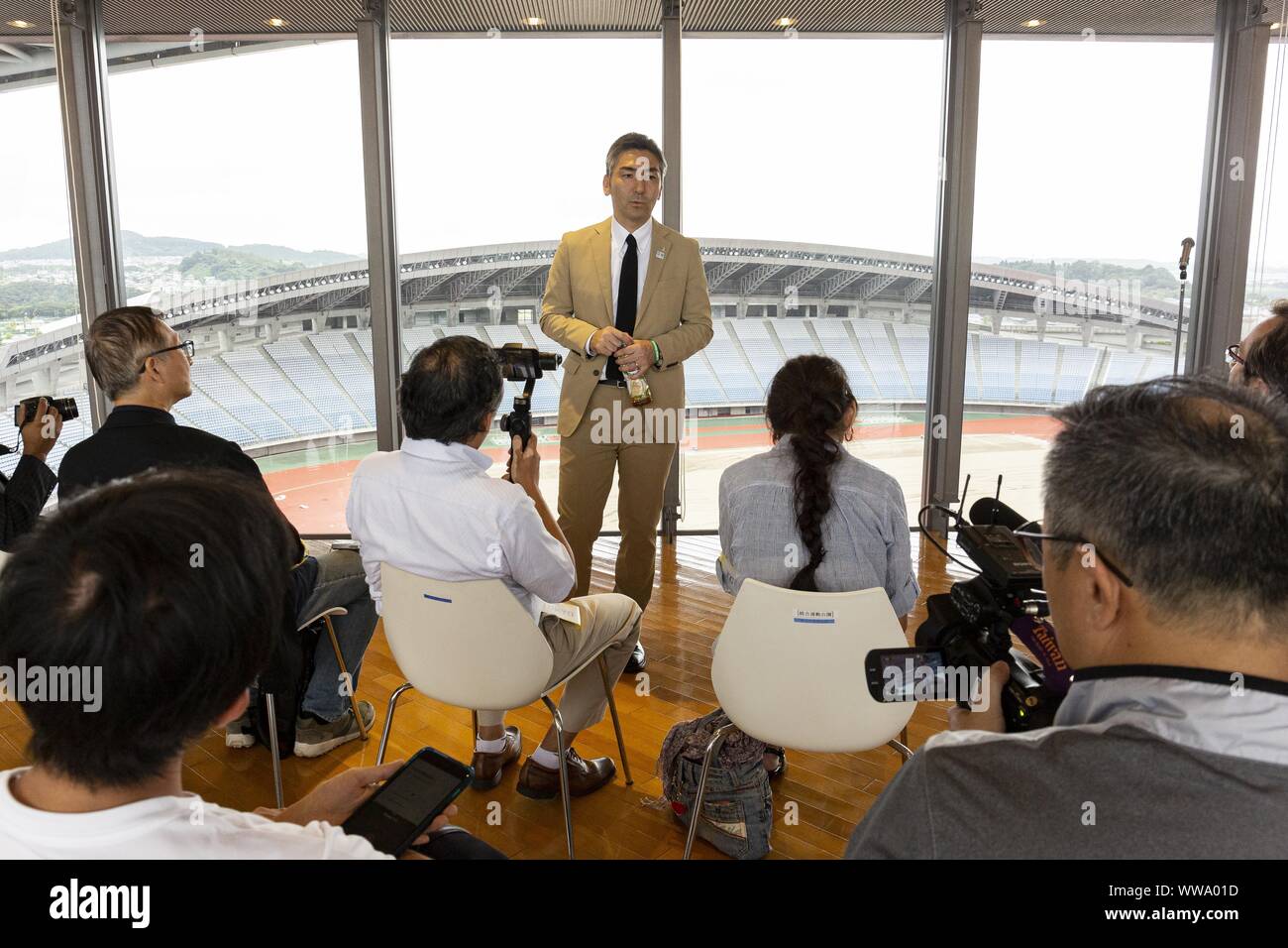 Miyagi, Japan. 14th Sep, 2019. Yutaka Kumagai, Rifu Town Mayor speaks with a group of foreign journalists at Miyagi Stadium. The stadium located in the town of Rifu was damaged by the 2011 Great East Japan Earthquake. A media tour organized by the Tokyo Metropolitan Government in collaboration with local authorities aims to showcase the recovery efforts in Tohoku area affected by the 2011 Great East Japan Earthquake and Tsunami. The stadium is the biggest stadium in the Tohoku area with a capacity of 49,000 people and will host the Tokyo 2020 football games. (Credit Image: © Rodrigo Reyes Stock Photo
