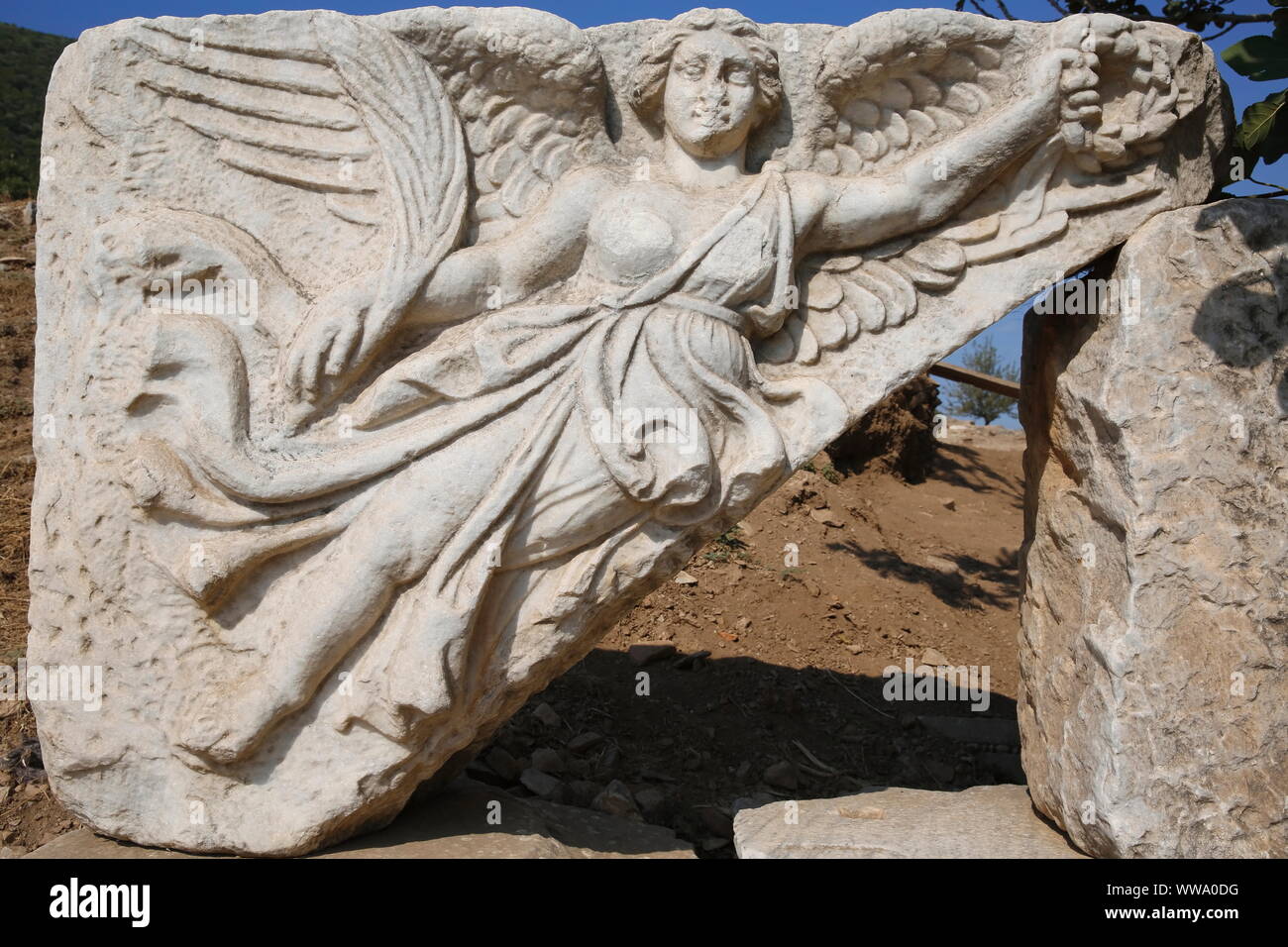 Stone relief of, the goddess of victory Nike, in the ancient city of Ephesus.  Izmir, Turkey Stock Photo - Alamy
