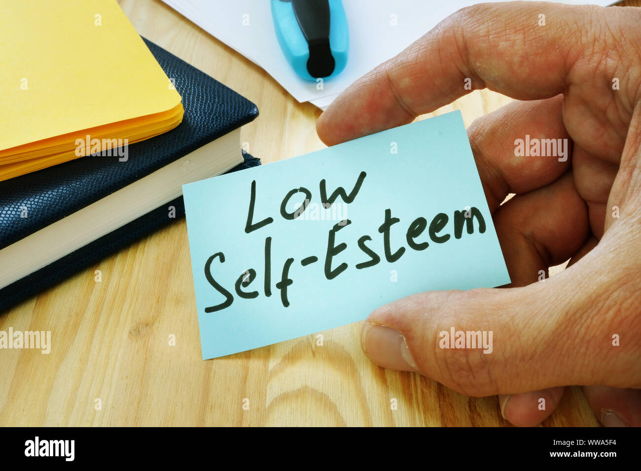 Low Self esteem sign in the hand. Stock Photo