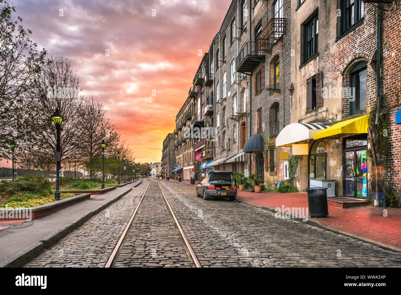 Savannah, Georgia, USA bars and restaurants on River Street at dawn. Stock Photo