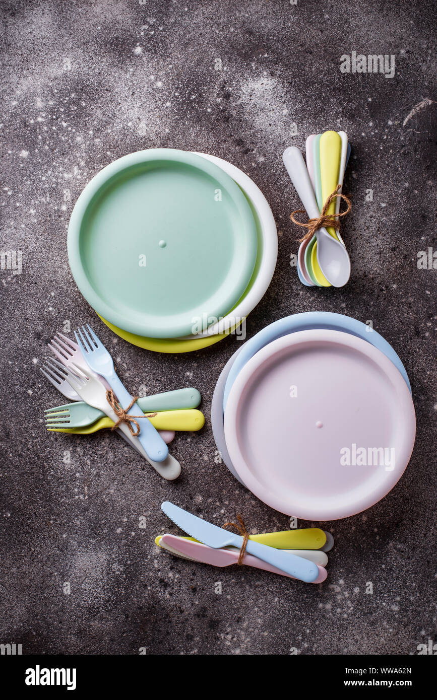 Colorful plastic dishes for summer picnic Stock Photo Alamy