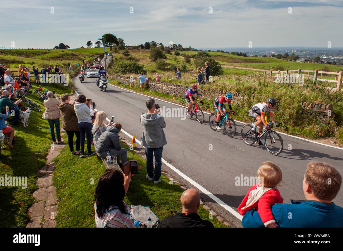 The leaders of the hill climb cycle across the top of Werneth Low Country Park during stage eight of the OVO Energy Tour of Britain from Altrincham to Manchester. Stock Photo