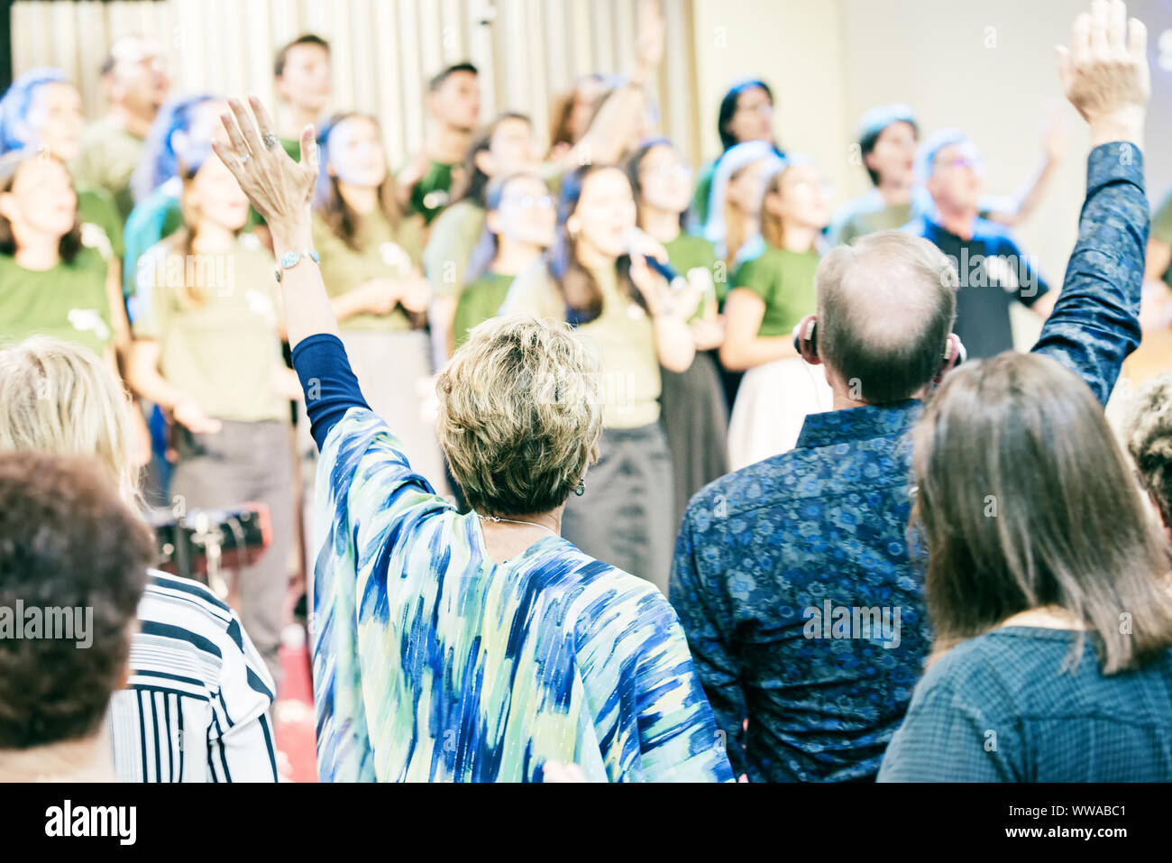 People at church, worshiping God, with hands up Stock Photo - Alamy
