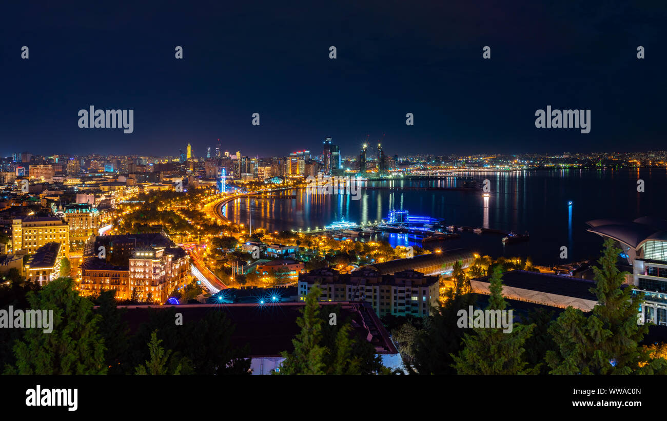 Wide panorama of night Baku city Stock Photo