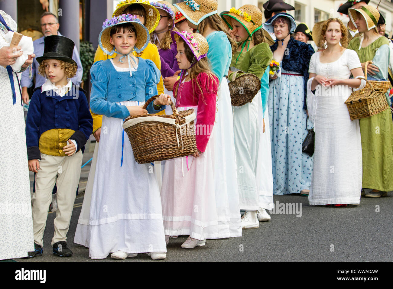 Bath, Somerset, UK. 14 Sep, 2019. Jane Austen fans are pictured taking part in the world famous Grand Regency Costumed Promenade. The Promenade, part of the 10 day Jane Austen Festival is a procession through the streets of Bath and the participants who come from all over the world dress in 18th Century costume. Credit:  Lynchpics/Alamy Live News Stock Photo
