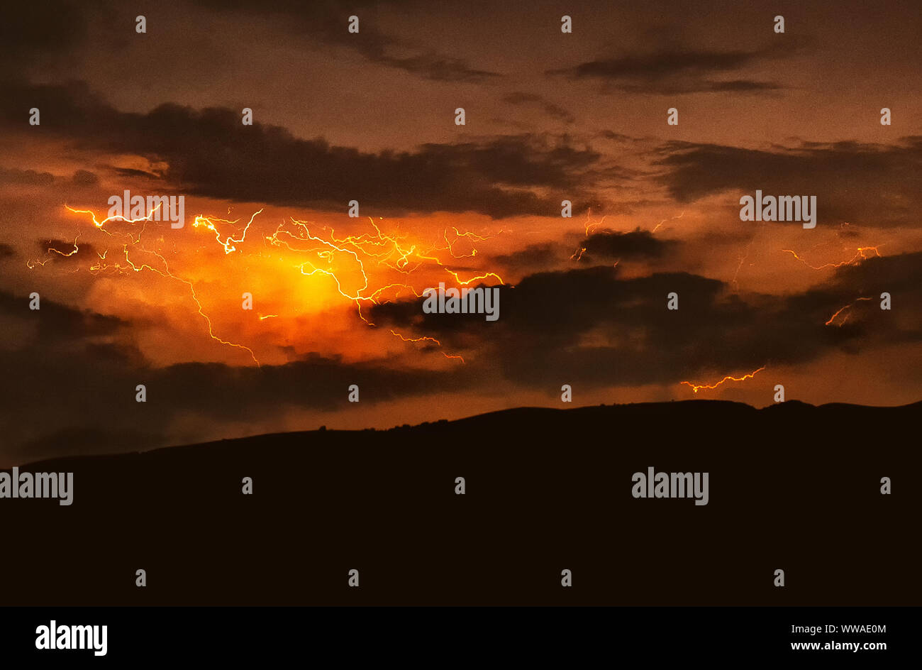 Lightning with dramatic clouds image . Night thunder-storm Stock Photo