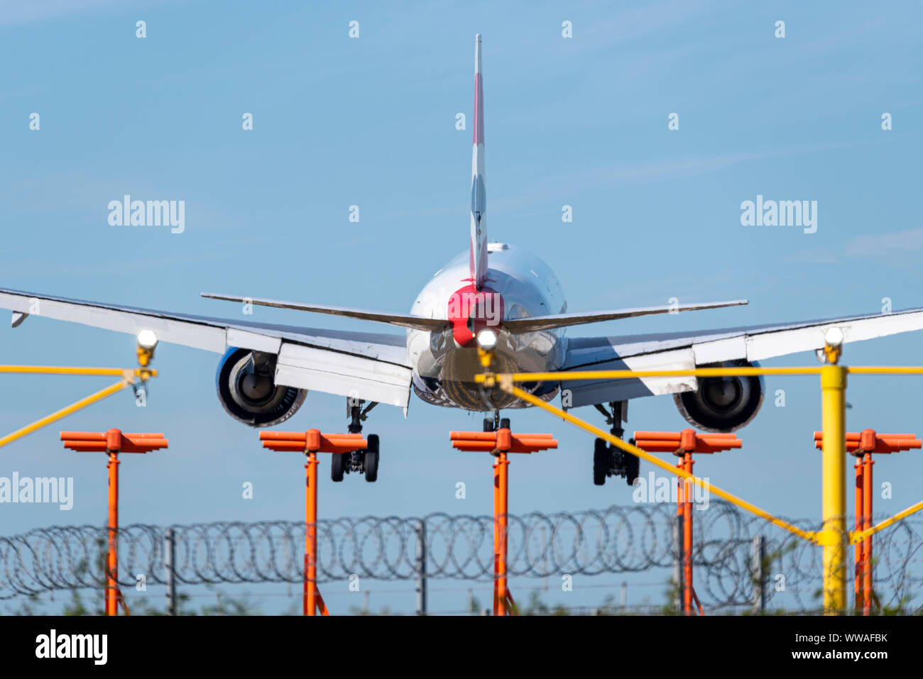 British Airways jet airliner plane landing at London Heathrow Airport