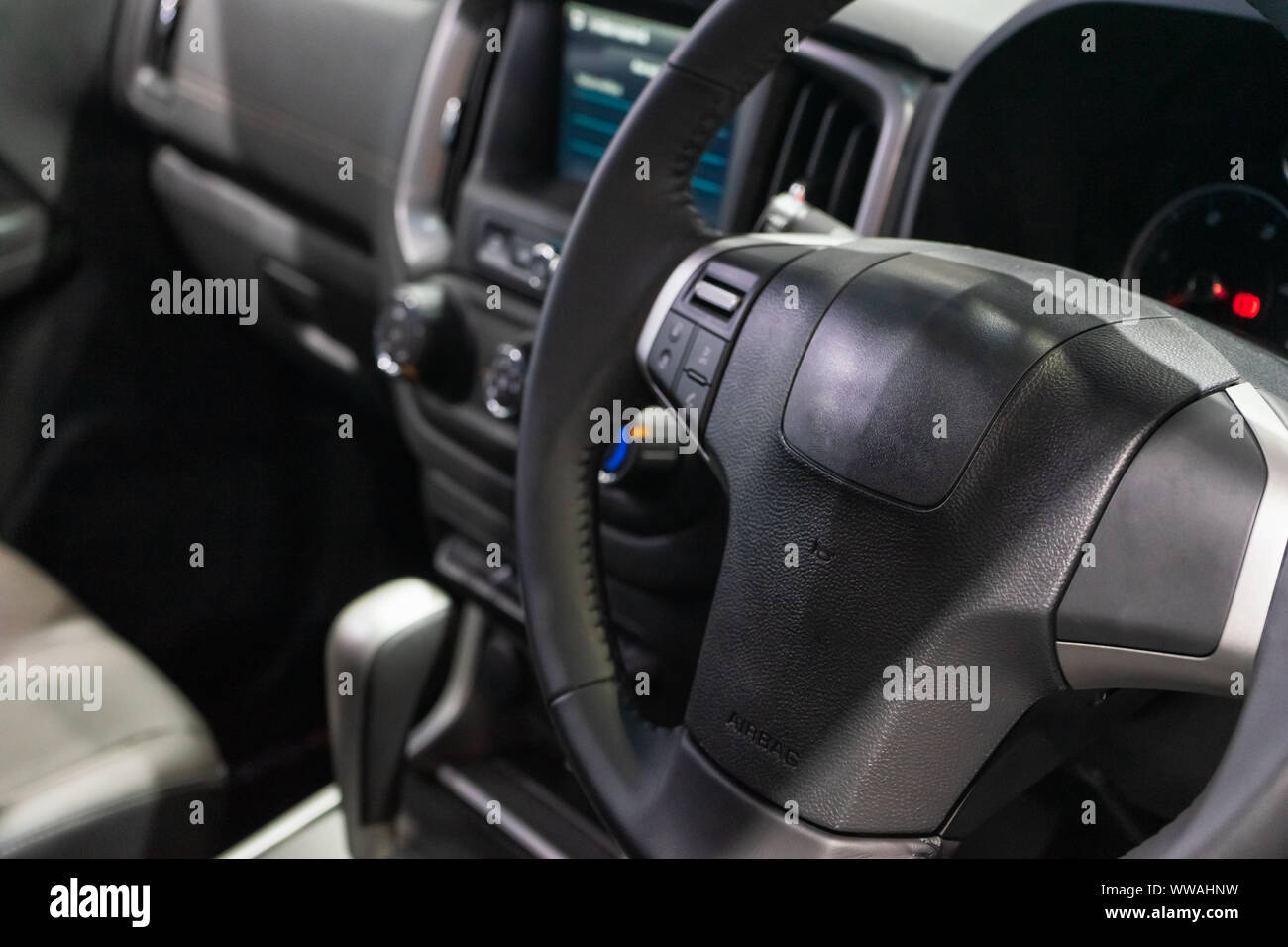 Interior view of modern car, Closeup of car steering wheel. Stock Photo