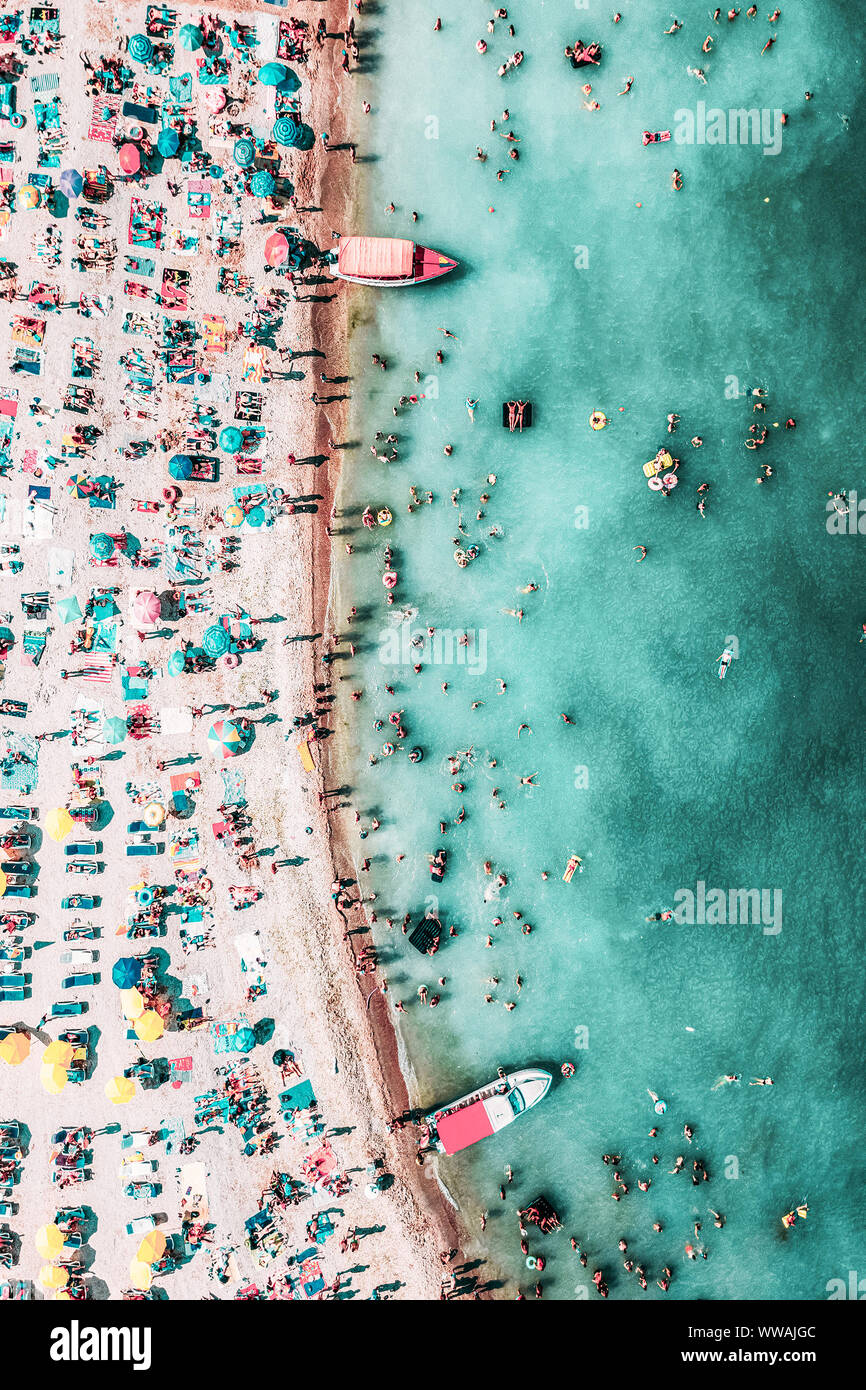 People Crowd On Beach, Aerial View Stock Photo