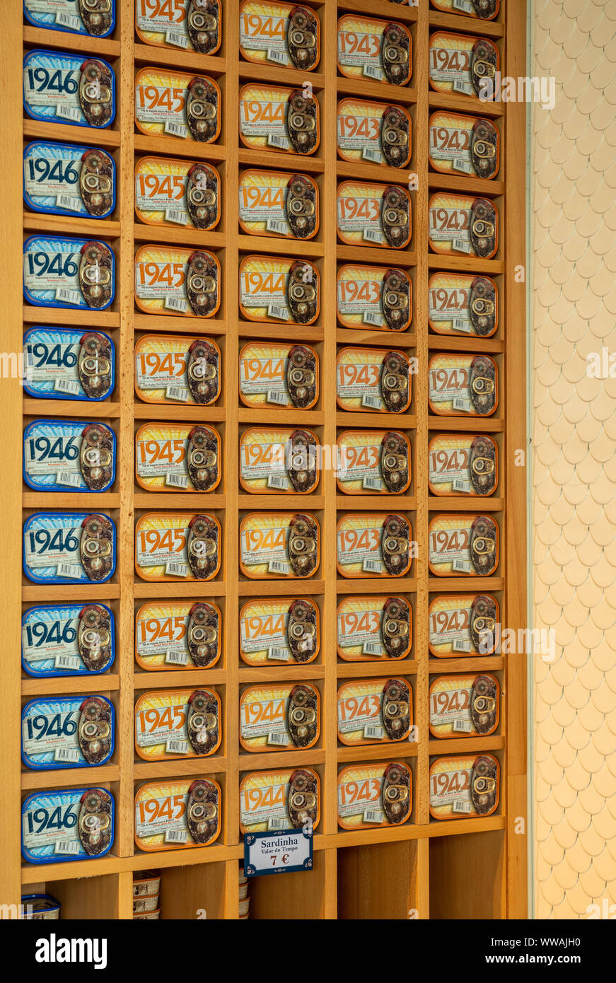 Stack of tinned sardines with dates in the 1940s in Comur shop Stock Photo