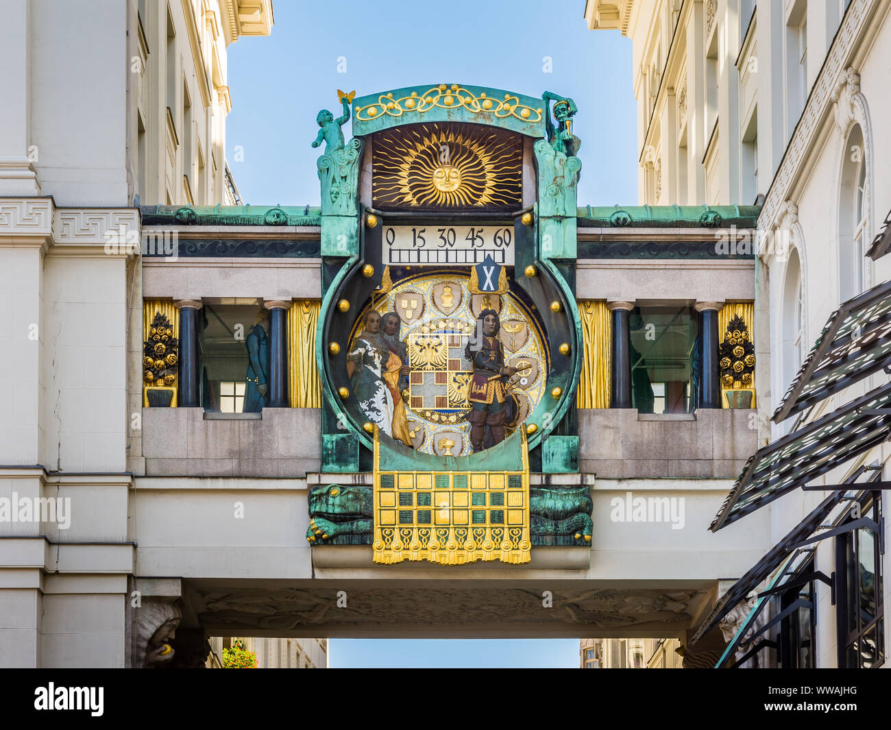 Richly decorated astronomical 'Anker' clock , Vienna, Austria. Stock Photo