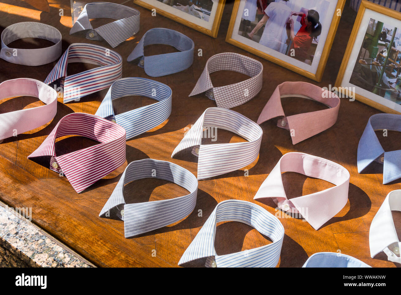 Assorted collars in shirtmaker's shop window display - Vienna, Austria. Stock Photo