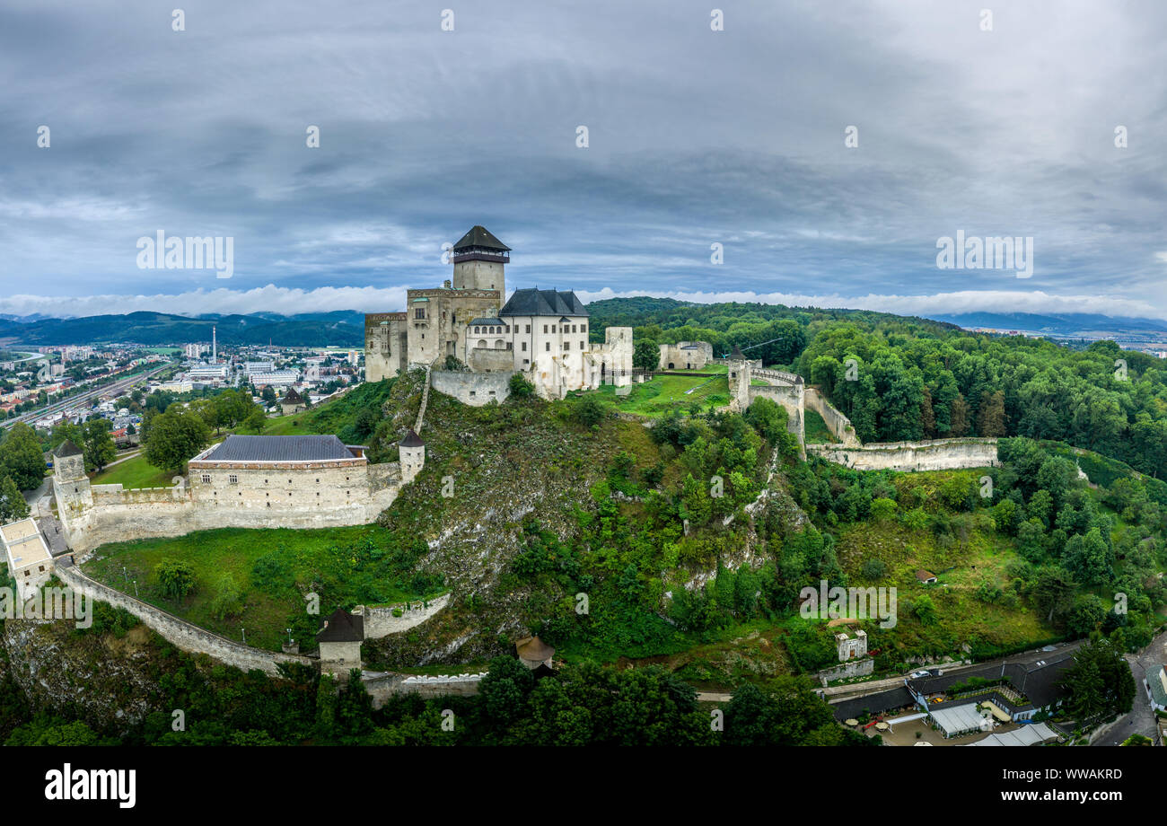 Aerial panorama of Trencin castle above the Vah river in Slovakia with dramatic sky Stock Photo