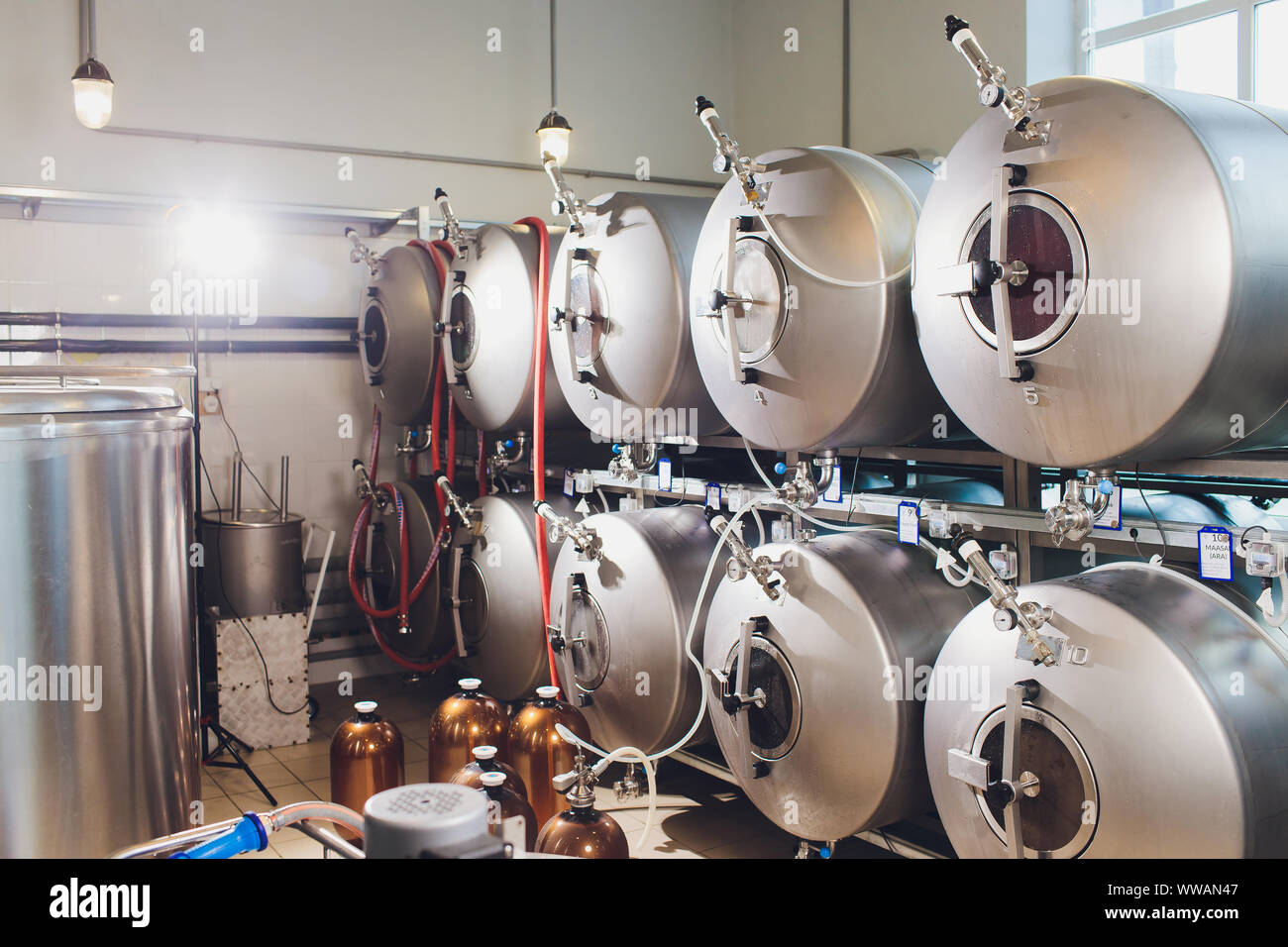 Craft beer brewing equipment in brewery Metal tanks, alcoholic drink