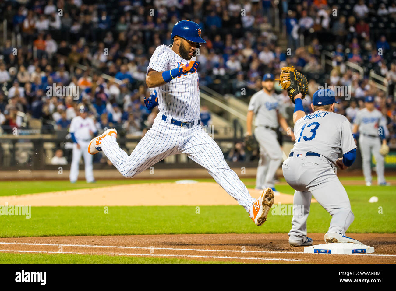 Queens, New York, USA. 13th Sep, 2019. New York Mets shortstop Amed Rosario (1) runs out a ground ball during the game between The New York Mets and The Los Angeles Dodgers at Citi Field in Queens, New York. Mandatory credit: Kostas Lymperopoulos/CSM/Alamy Live News Stock Photo