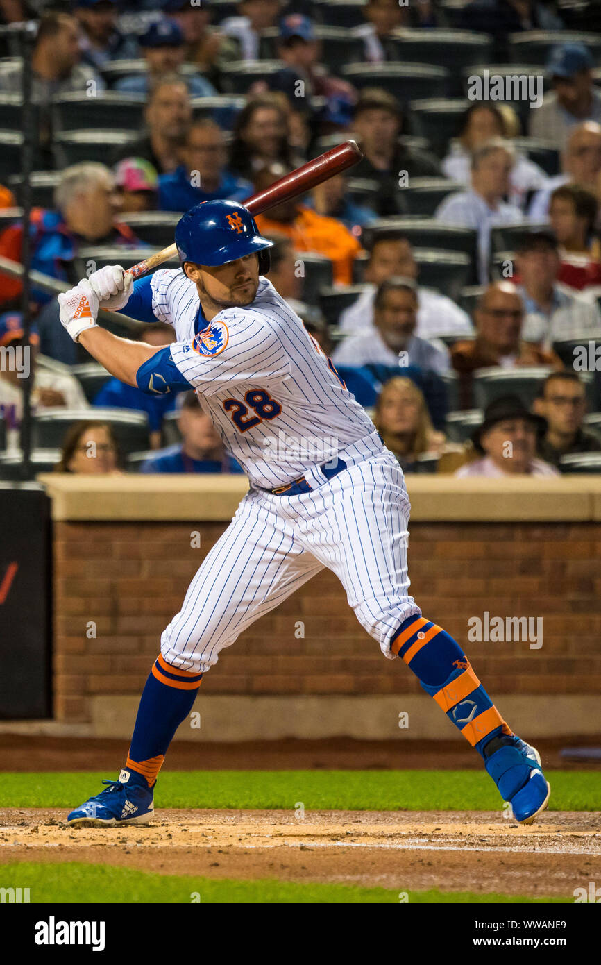 Queens, New York, USA. 13th Sep, 2019. New York Mets third baseman J.D. Davis (28) winds up to swing prior to hitting a home run during the game between The New York Mets and The Los Angeles Dodgers at Citi Field in Queens, New York. Mandatory credit: Kostas Lymperopoulos/CSM/Alamy Live News Stock Photo