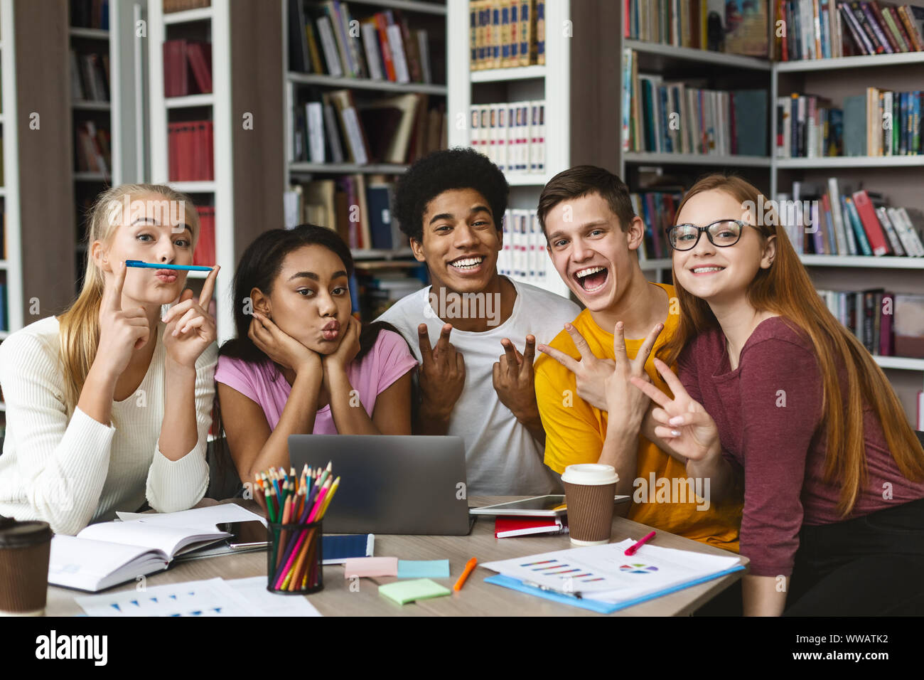 Group of international students having fun while studying Stock Photo