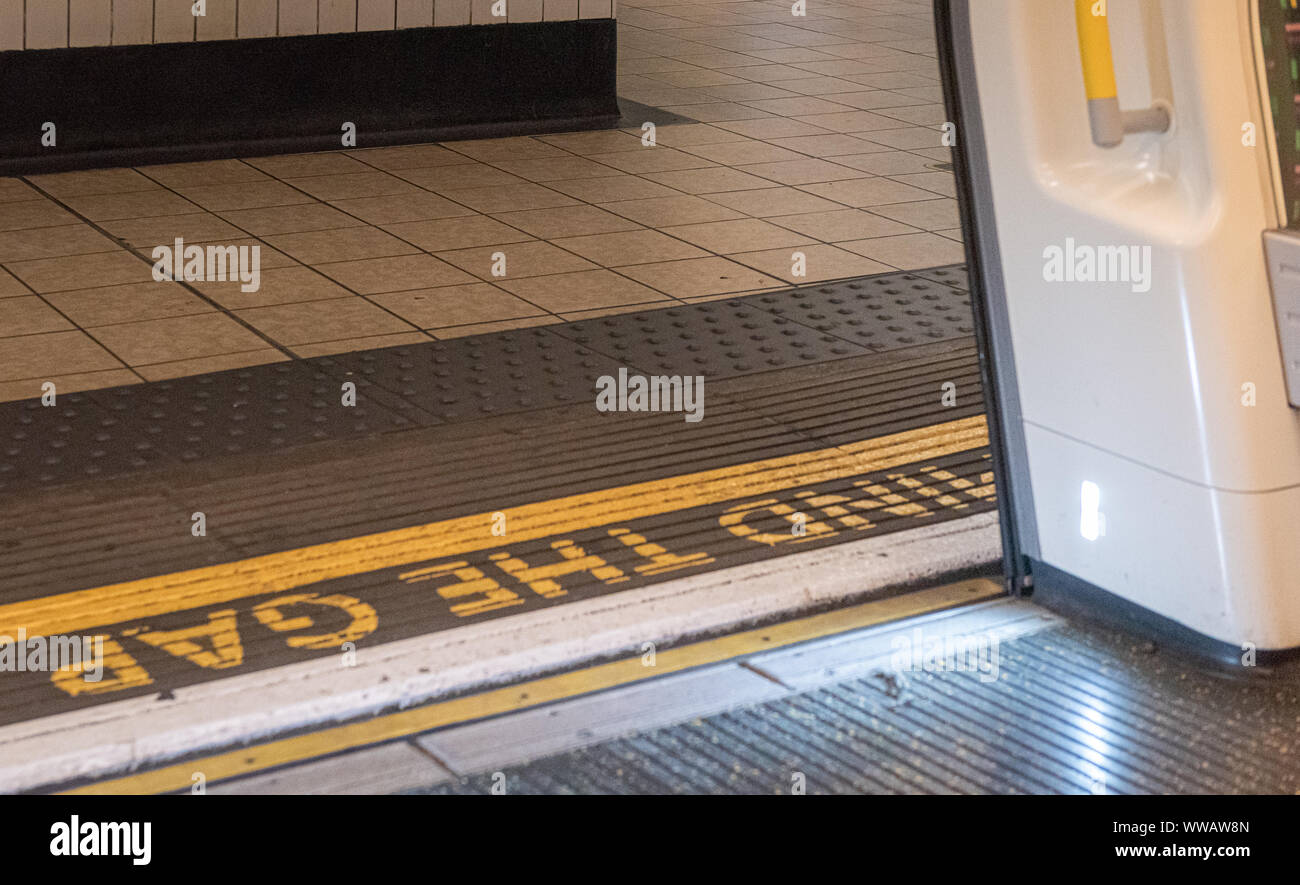 Mind the Gap - London, UK tube floor Stock Photo