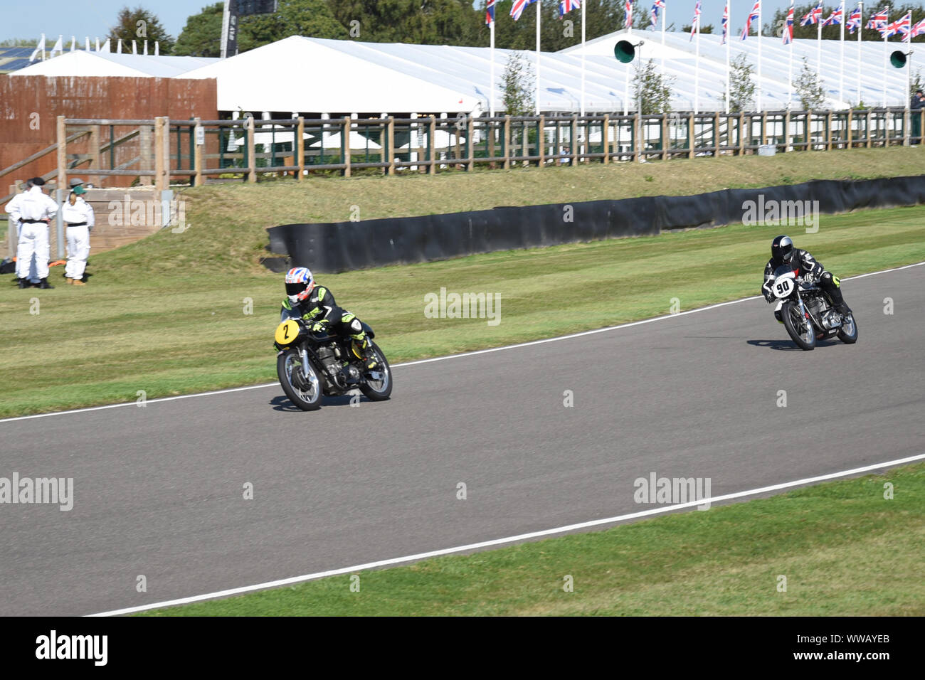 Goodwood Revival 13th September 2019 - Barry Sheene Memorial Trophy  - 1962 AJS-Matchless 7R followed by 1962 Norton Manx 30M Stock Photo