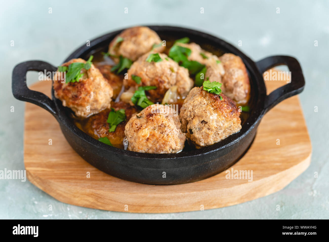 Homemade pork and beef meatballs in gravy Stock Photo Alamy