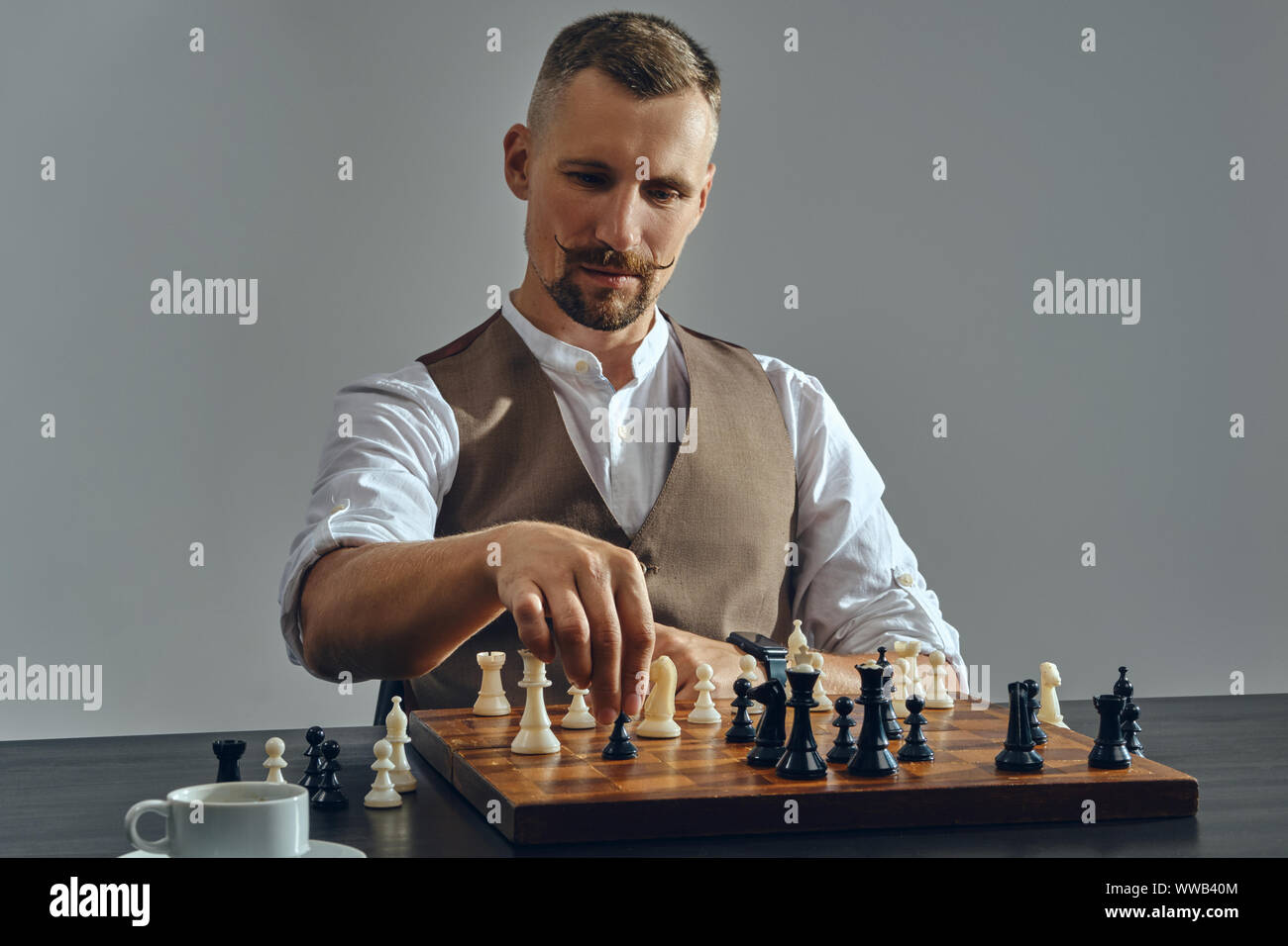 Man playing chess. Play with God or with yourself. Concept - strategy  goals, efforts, plans. Stock Photo