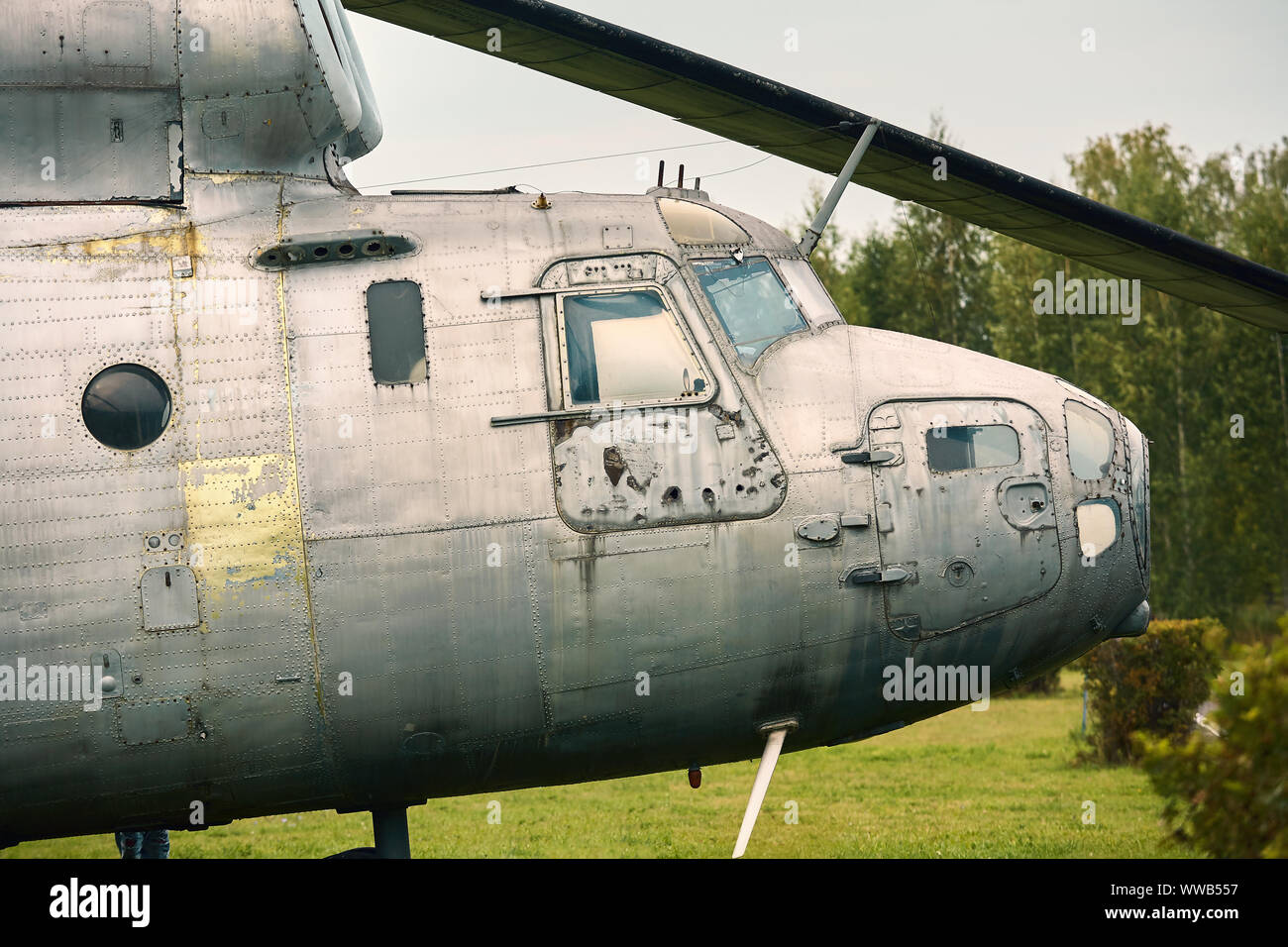 Combat helicopter gray color close-up. Color tinting. Stock Photo