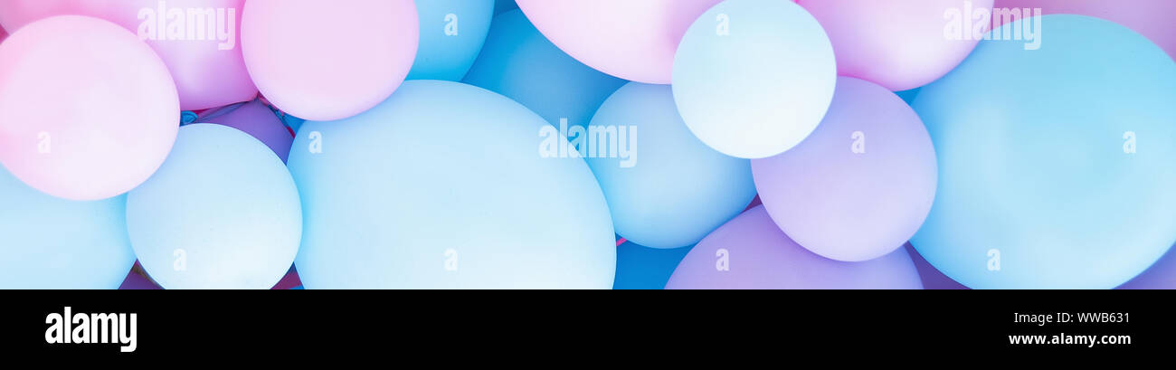 many balloons on wall colorful birthday decorations Stock Photo