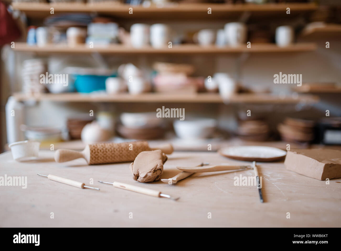 Plottery equipment on wooden table in workshop Stock Photo