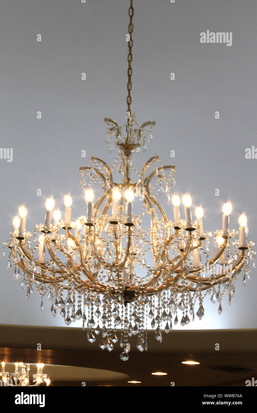 Large chandelier hanging in an elegant store Stock Photo