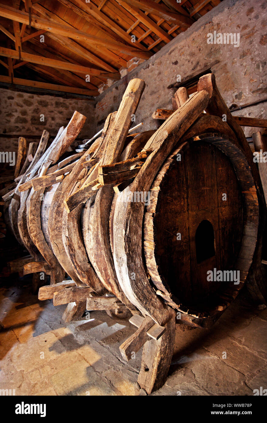 A gigantic wooden barrel (12.000 liters) for wine storage, in Varlaam monastery, Meteora, Trikala, Thessaly, Greece. Stock Photo