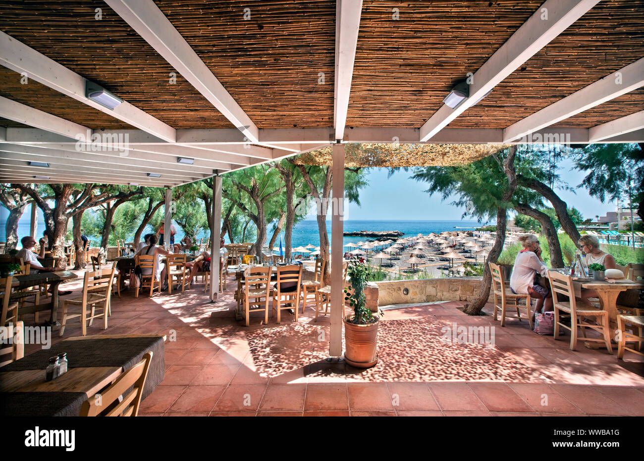 Traditional Cretan tavern at Kakkos Bay hotel, between Koutsounari and Ferma villages, Ierapetra Municipality, Lassithi, Crete, Greece. Stock Photo