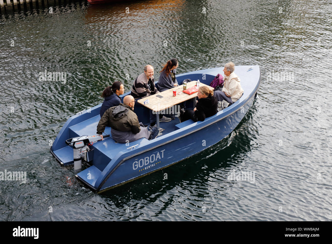 https://c8.alamy.com/comp/WWBAJM/copenhagen-denmark-september-4-2019-a-group-of-people-in-a-small-electric-rental-goboat-personal-sightseeing-boat-in-the-canal-in-the-fredrikshav-WWBAJM.jpg