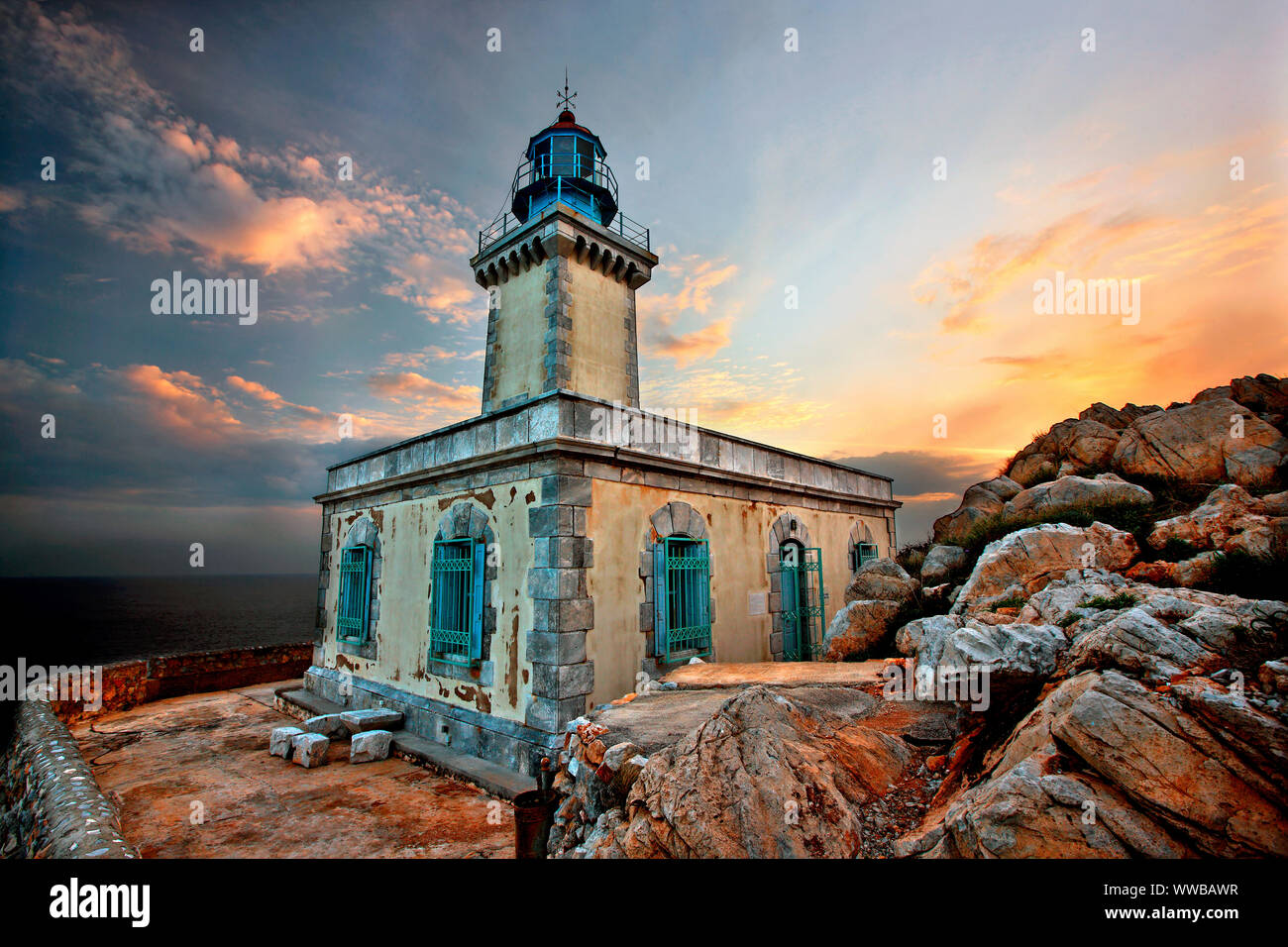 Sunset at the lighthouse in Akrotainaron (also known as 'Cape Tainaron'  on the southernmost corner of Mani region, Lakonia, Peloponnese, Greece Stock Photo