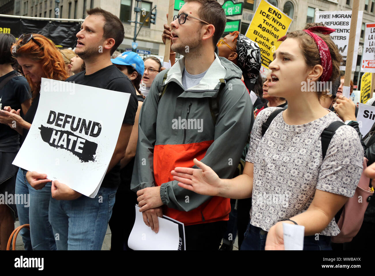 New York, USA. 14th Sep, 2019. Activists protesting the U.S. Immigration and Customs Enforcement (ICE) policies and family separation practices, rallied on the steps of the NYC Public Library on 14 September, 2019 and then marched to technology giant Microsoft's Fifth Avenue retail store, where they joined other protesters who had already blockaded the entrance and some, occupied the interior of the store. Credit: G. Ronald Lopez/ZUMA Wire/Alamy Live News Stock Photo
