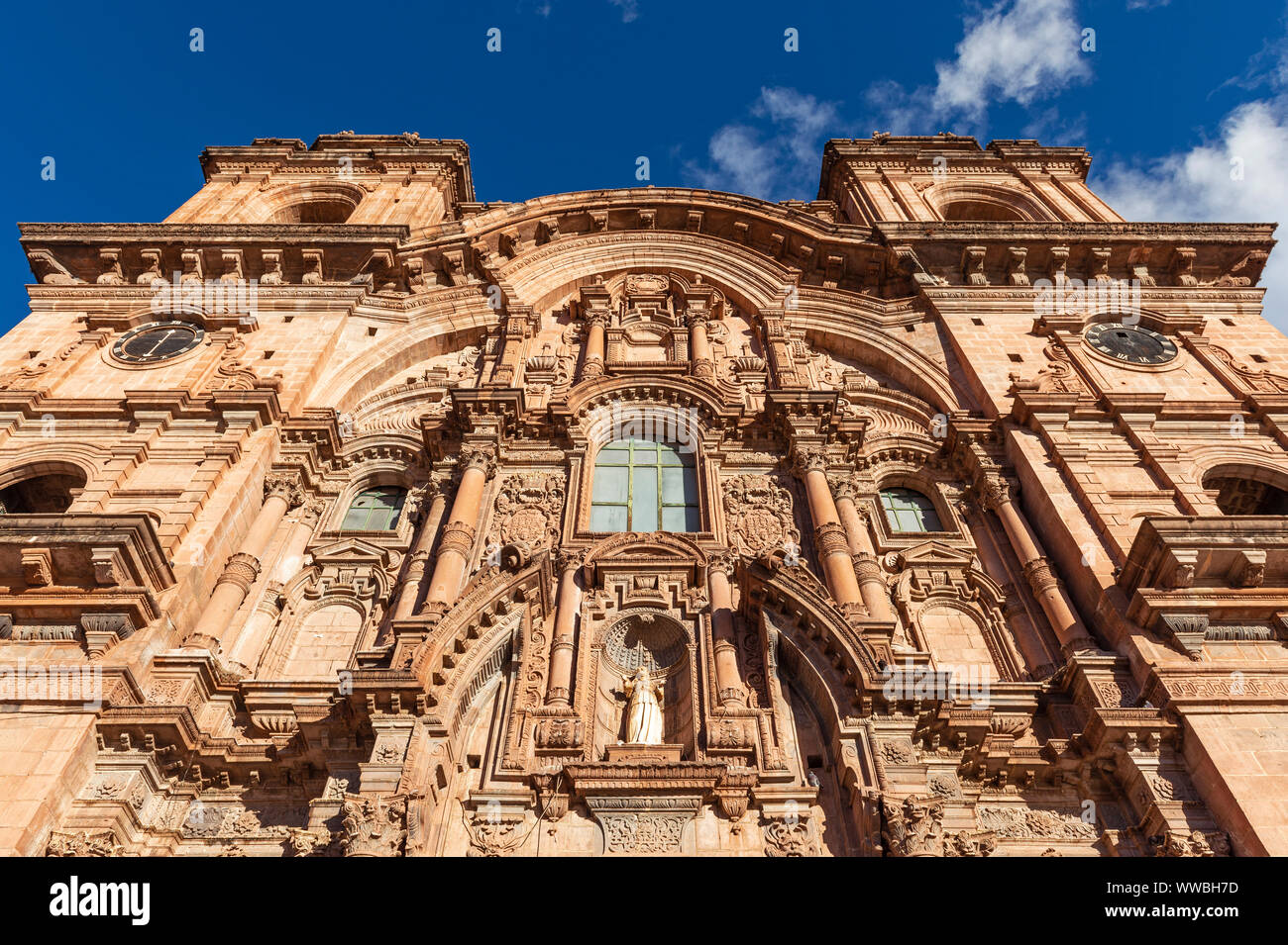 Facade of the baroque style Compania de Jesus church, Plaza de Armas main square, Cusco, Peru. Stock Photo