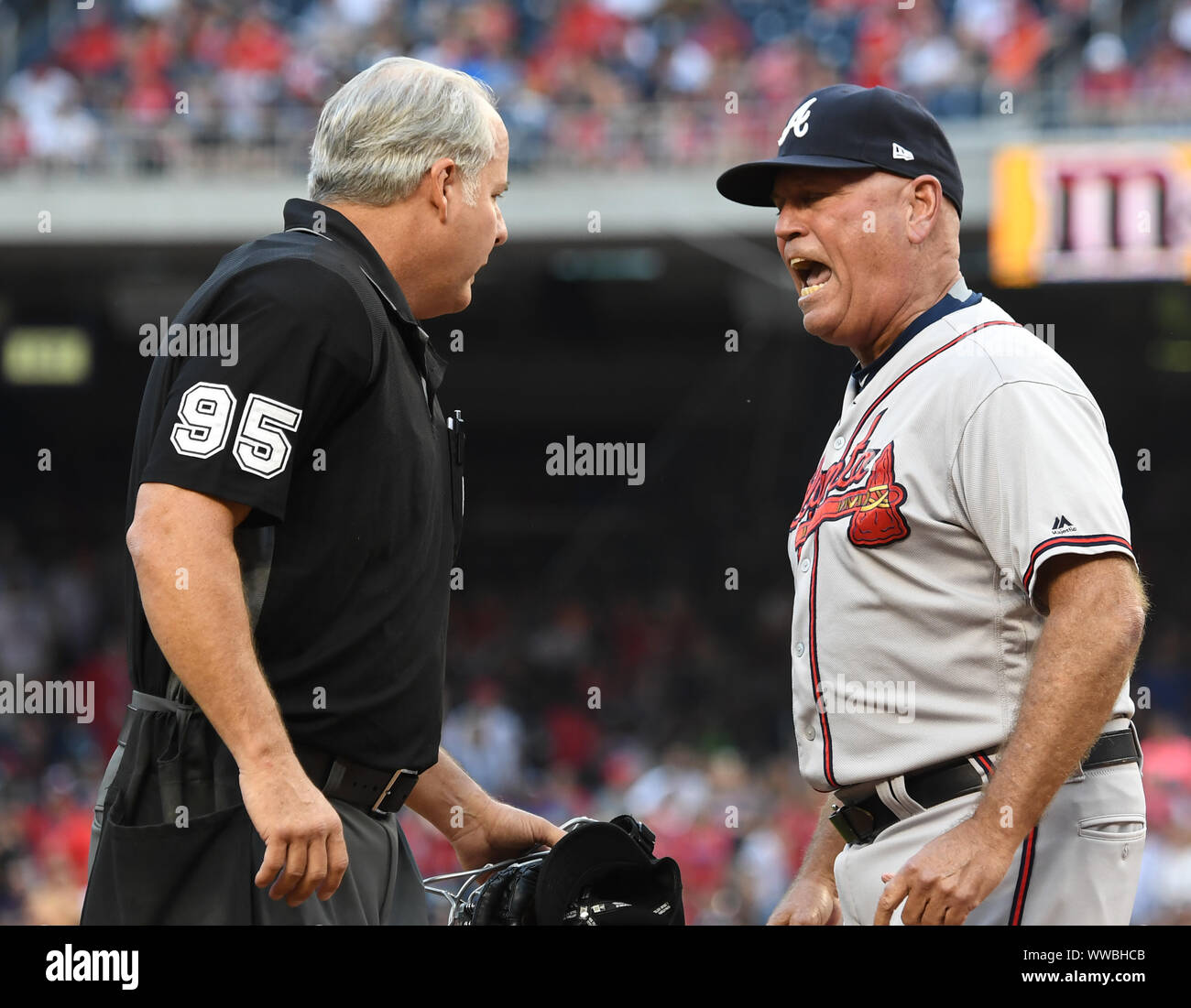Atlanta Braves Manager Brian Snitker argues with Home Plate Umpire Tim Timmons after Braves Charlie Culberson was hit by a pitch while trying to bunt by Washington Nationals Fernando Rodney in the seventh inning of game at Nationals Park in Washington, DC on September 14, 2019. Culberson left the game and the pitch was called a strike.  Snitker was tossed from the game for arguing the strike call.      Photo by Pat Benic/UPI Credit: UPI/Alamy Live News Stock Photo