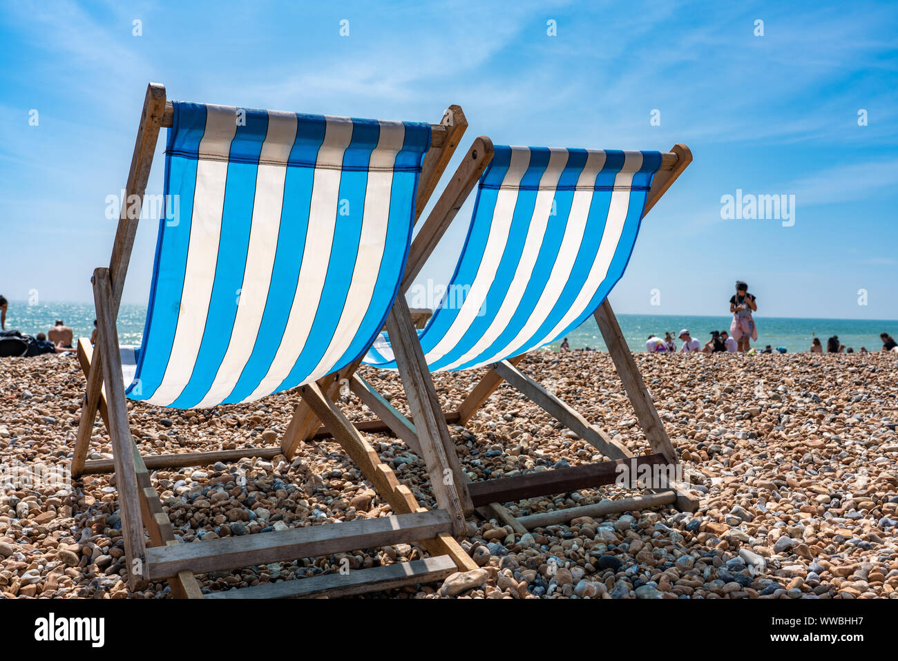 Deck Chair on Brighton Beach in the summer time Stock Photo Alamy