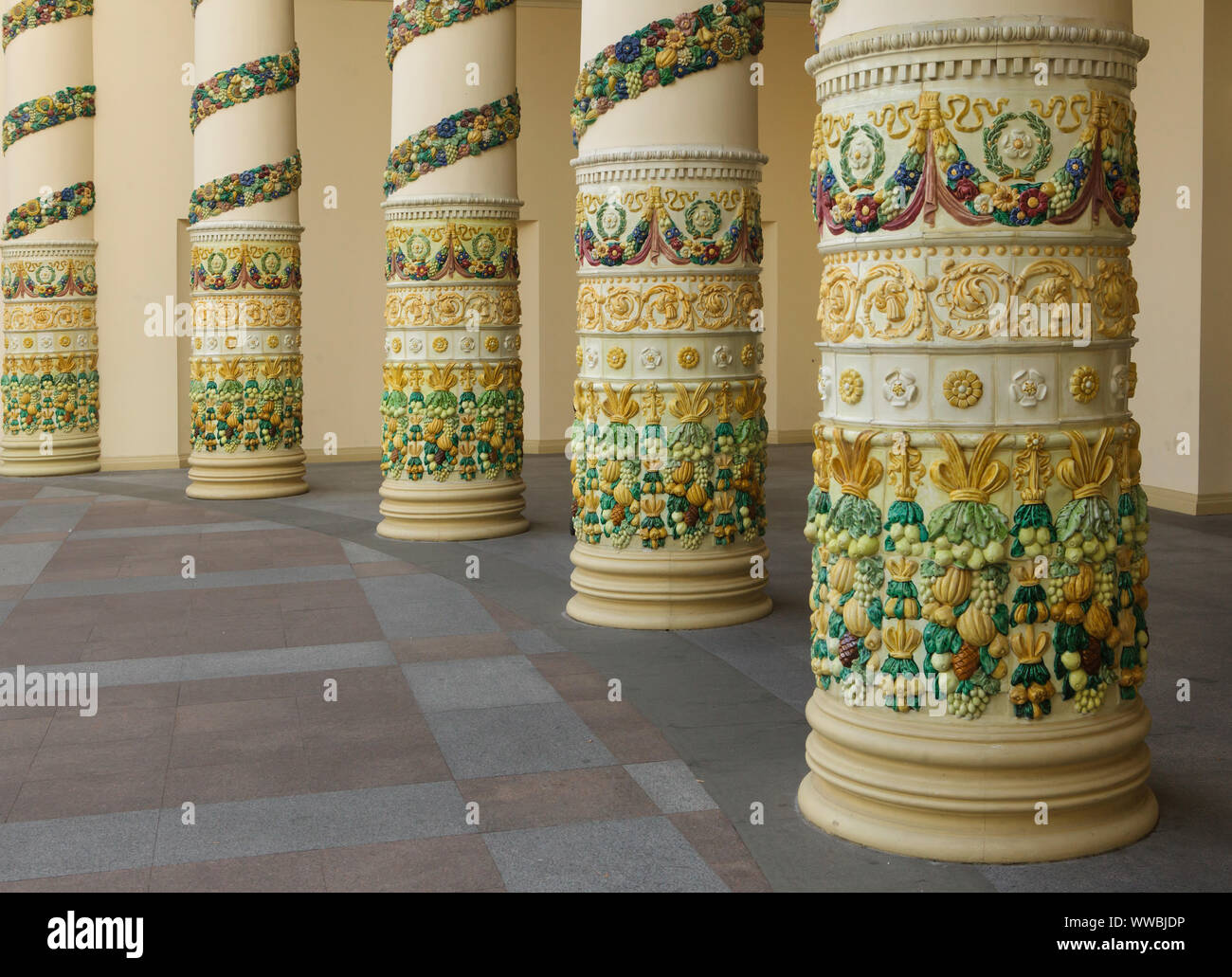 Glazed majolica columns at the main entrance to the Byelorussia Pavilion (Belarus Pavilion) in the VDNH exhibition ground (Exhibition of Achievements of National Economy) in Moscow, Russia. The exhibition pavilion designed by Soviet architects Grigory Zakharov and Zinaida Chernysheva was built in 1954. It was also used later as the Electrical Technology Pavilion. Stock Photo