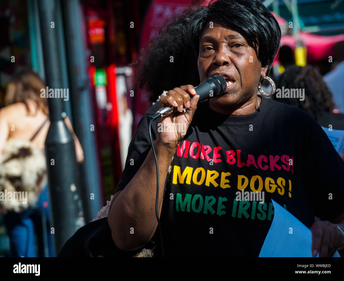 London, UK. 14th September 2019. Eulalee who has been fighting the Home Office for 16 years speaks at the Movement for Justice and Lambeth Unison Black Workers' Group protest in Brixton Market against the continuing persecution of Windrush family members and other migrants, calling for freedom of movement, the closure of immigration detention prisons, and an end to Brexit which is being used to whip up immigrant-bashing and nationalism to establish a Trump-style regime in Britain under Boris Johnson. Peter Marshall/Alamy Live News Stock Photo