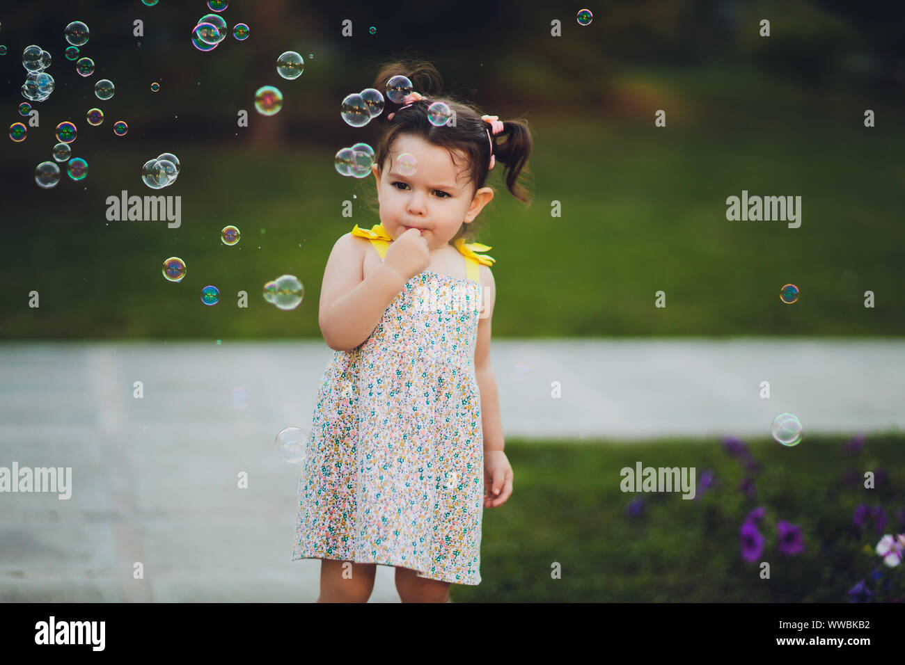 The image of a cute little girl with bubbles Stock Photo Alamy