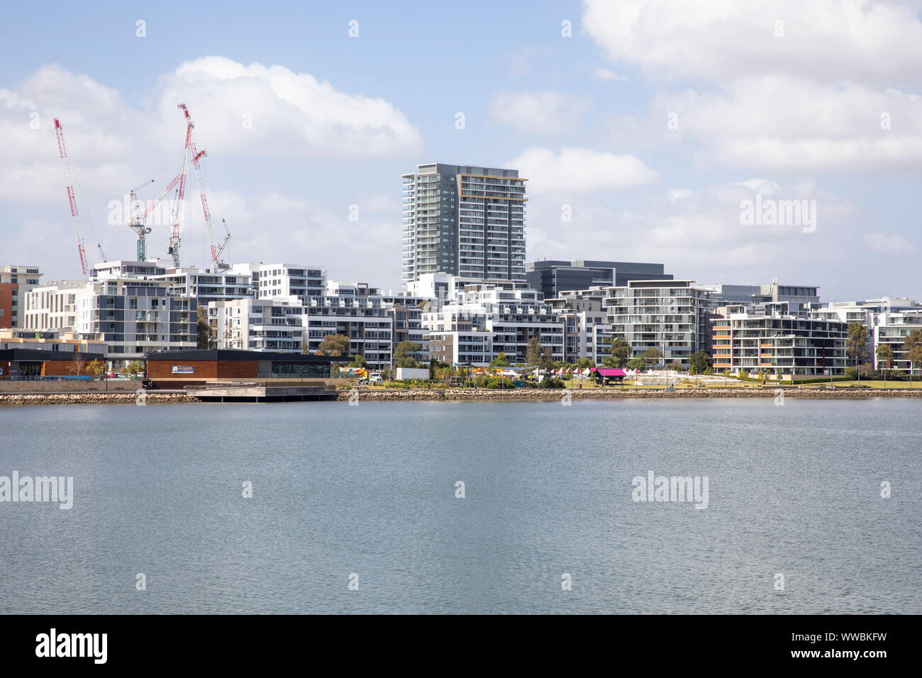 Development construction and high rise apartment living at Rhodes a suburb of Sydney on the parramatta river,Sydney,Australia Stock Photo