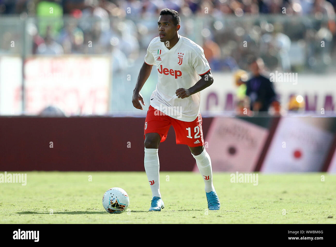 Christian Kouame of ACF Fiorentina and Alex Sandro of Juventus FC compete  for the ball during the Serie A football match between Juventus FC and ACF  Stock Photo - Alamy