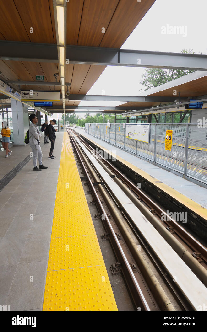 People Waiting On Platform For The Skytrain Vancouver B C Canada 