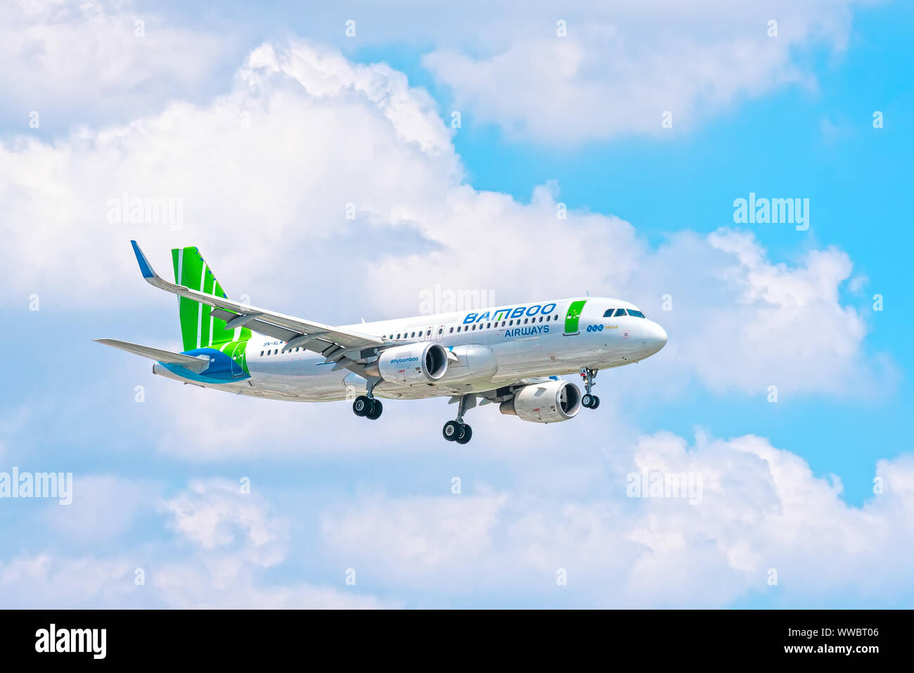 Airplane airbus A320 of Bamboo Airways flying through sky prepare to