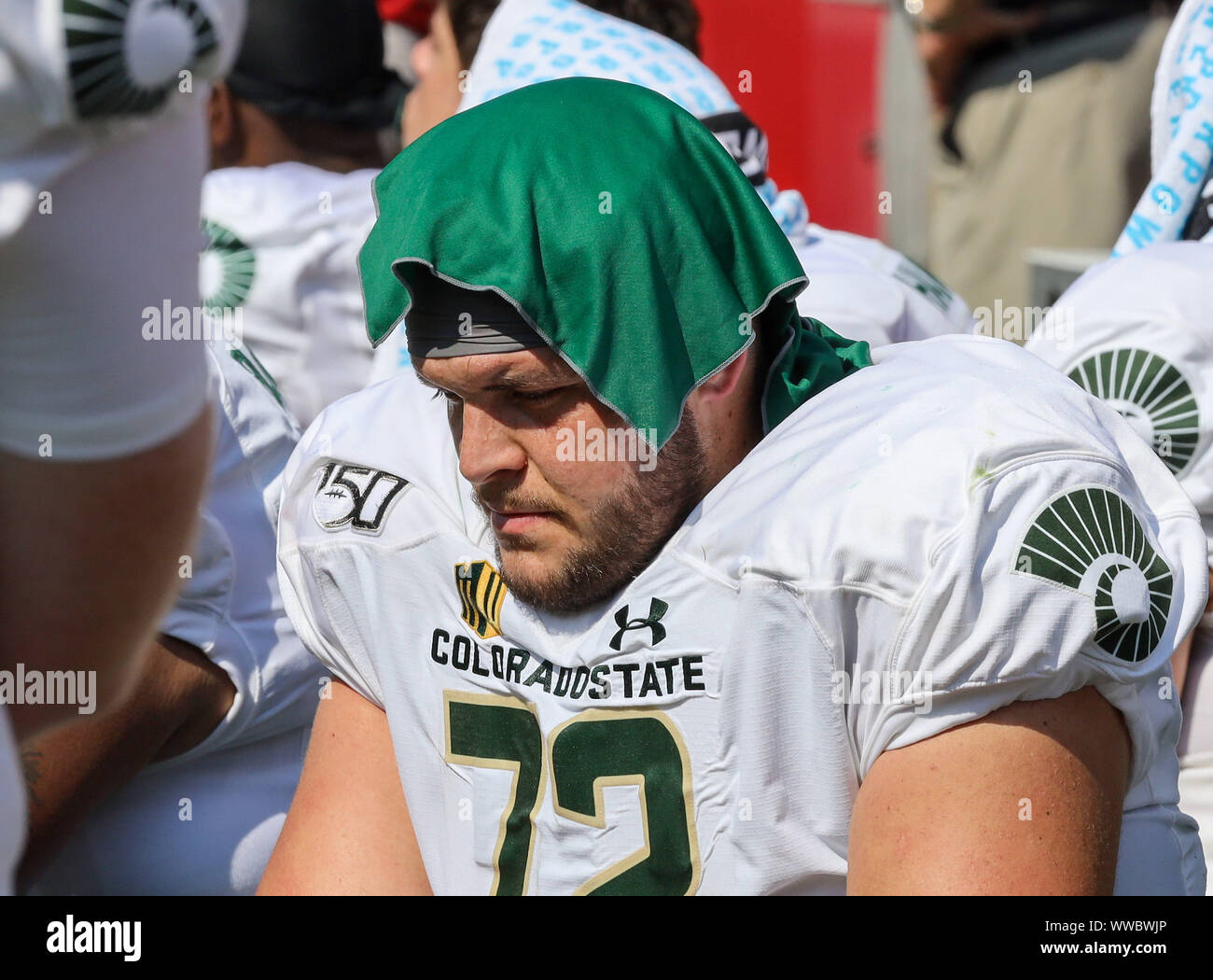 The Bench. 14th Sep, 2019. T.J. Storment #72 Colorado State offensive tackle rest with a wet towell on the bench. Arkansas defeated Colorado State 55-34 in Fayetteville, AR, Richey Miller/CSM/Alamy Live News Stock Photo