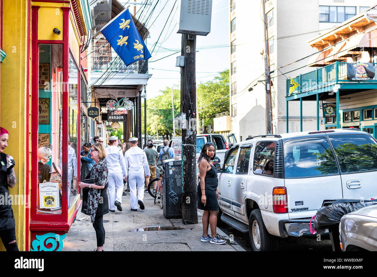 New Orleans, USA April 22, 2018 Frenchmen street in Louisiana old town city with people